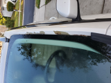 peeling around drivers windshield