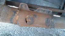 rear axle/control arm cracked at point fixed under recall