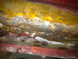 rocker panel rust perforation