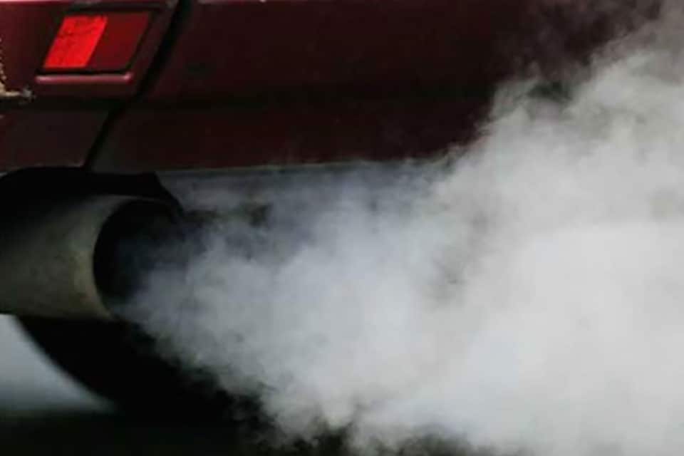 Cloud of emissions from a tail pipe