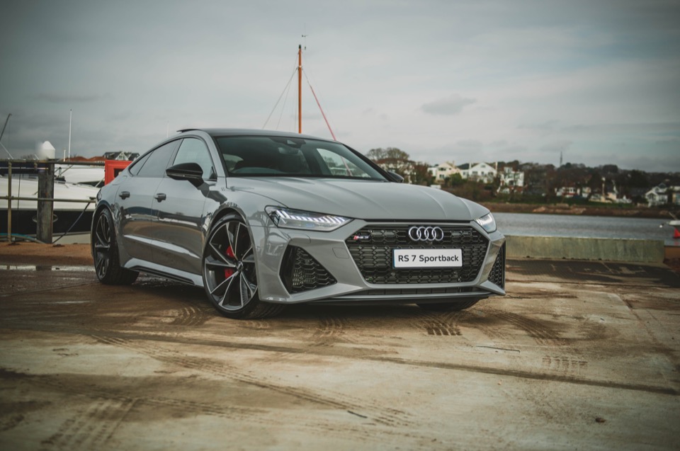 Gray RS 7 Sportback on a concrete dock near the water