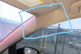 Poorly drawn blue box outlining damage made to the headliner from rain leaking in through the sunroof.