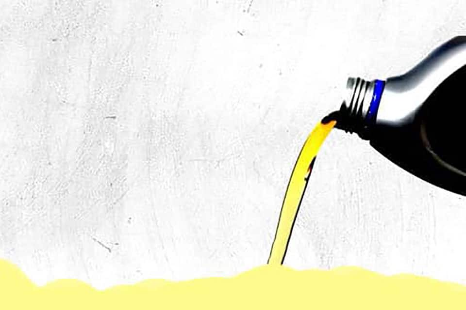 An illustrated oil bottle pouring out a yellow-green oil.