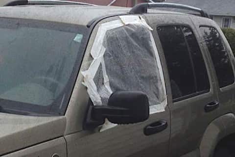 A missing Jeep window that's all taped up