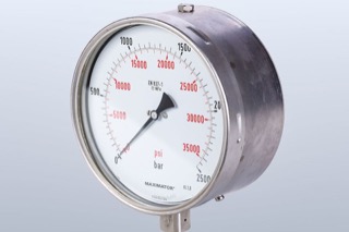 A pressure manometer with the arrow pointing to zero