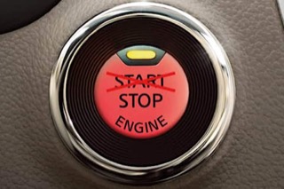 Push start ignition with start crossed out and replaced with stop