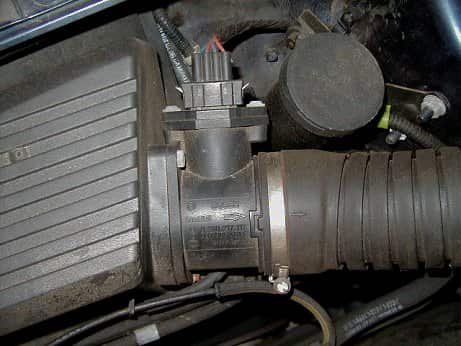 An overhead view of the mass airflow sensor in the engine
