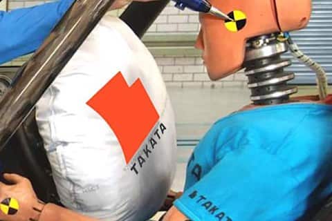 Deployed airbag with super-imposed Takata logo