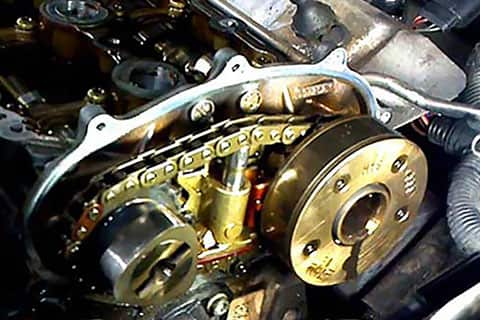 Gold timing chain in a VW engine