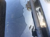 rear window shattered while parked