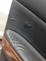 arm rest leather on door panel cracking