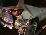 driver's seat collapsed into rear passenger seat