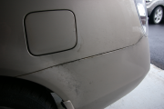 dirt and corrosion in seams on rear quarter panels