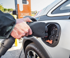 Car owners about to plug-in to an EV charging station