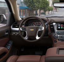 Brown Chevy interior looking towards the steering wheel