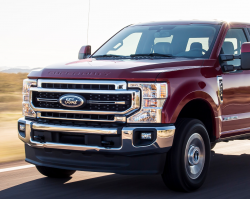 The front-half of a red Super Duty truck