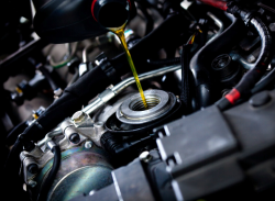 Oil being poured into an engine