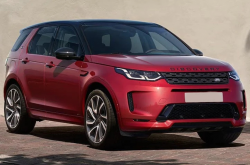 A red Land Rover Discovery SUV