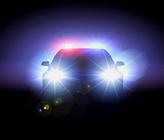 is it illegal to flash your headlights to warn of police