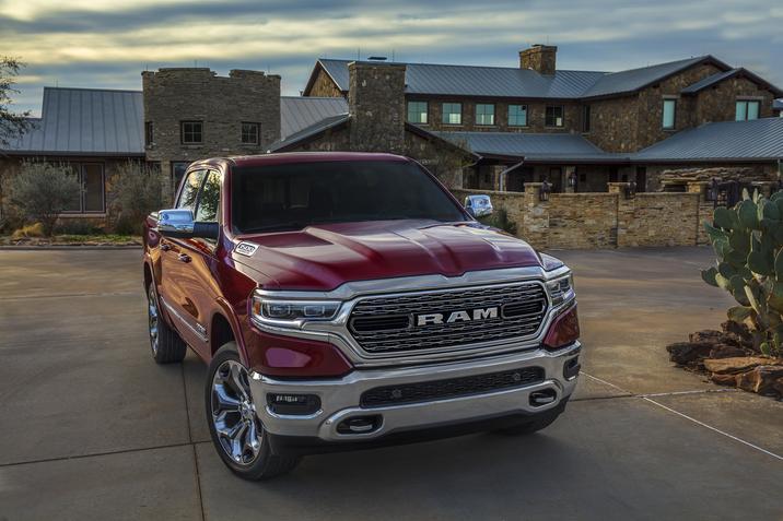 Red Ram truck in a driveway