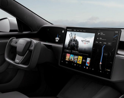 Tesla Passenger Play Investigation Opened, Tesla Disables Feature
