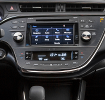 A Toyota console with infotainment screen turned on